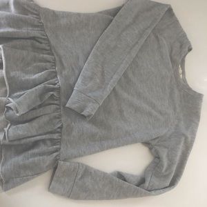 Ruffle hem sweatshirt